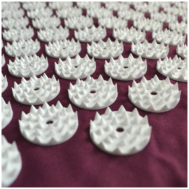 Close up of acupressure mat spikes